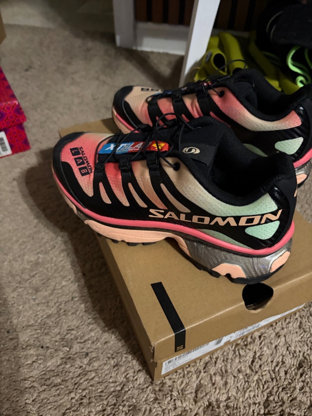 Salomon Women's Black with Pink and Peach Gradient Trail Runners